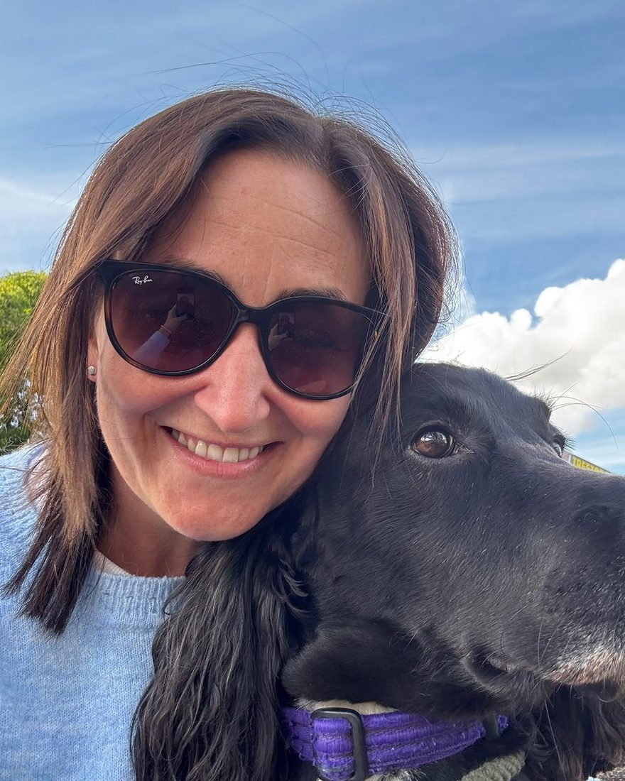 Amy, founder of pheme, with her dog Douglas